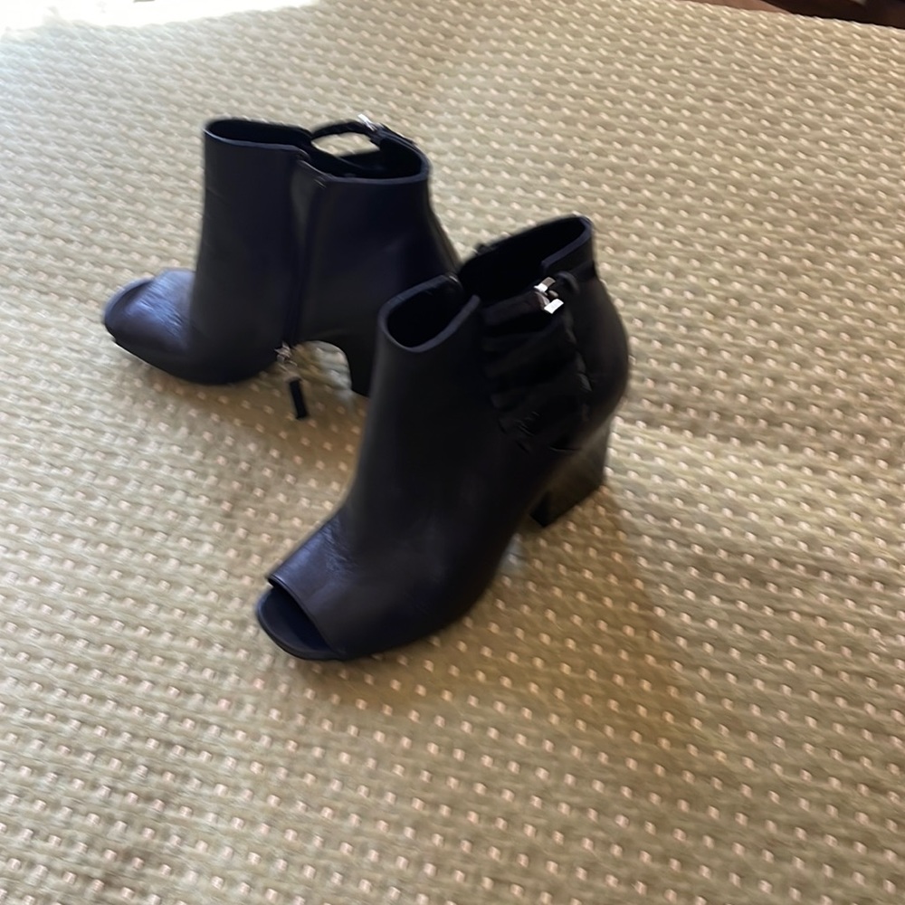 Lauren Ralph Lauren it should say at all. Love these shoes.